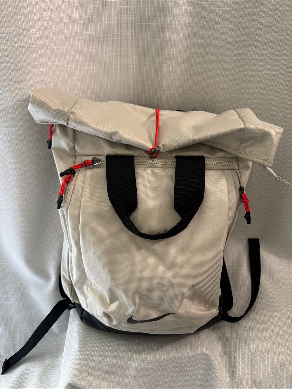 Nike Men's Cream Roll-Top Backpack with Black Handles and Orange Pulls